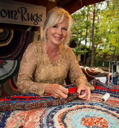 Visiting craftsmen at Silver Dollar City's National Harvest & Cowboy Festival, near Table Rock Lake, demonstrate their talents.