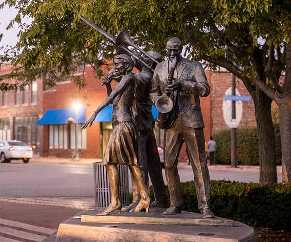 The bronze Jazz Trio sculpture by artist Littleton Alston at Dreamland Plaza on North 24th Street in Omaha, Nebraska