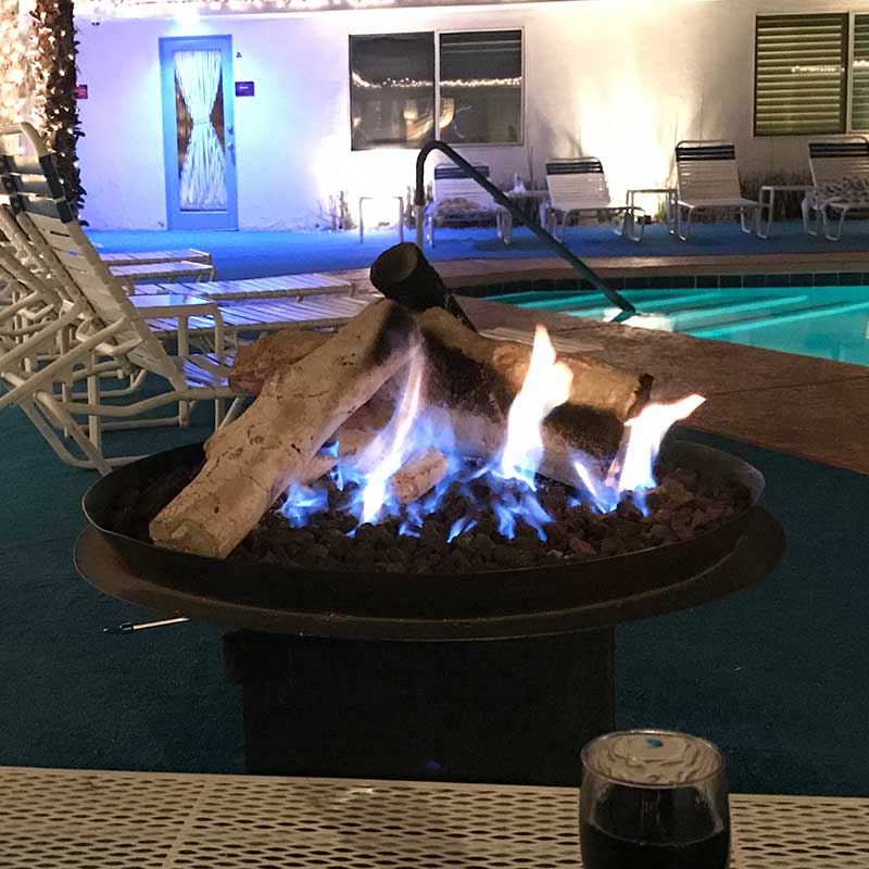 Fireplace by the pool at Palm Springs Rendezvous in California