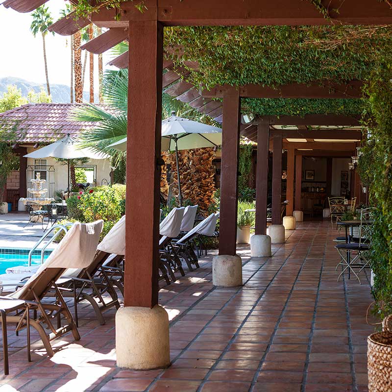 Tiled walkway beside the pool at La Maison Hotel in Palm Springs, California