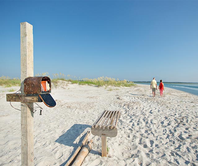 The rusty metal Wrightsville Beach Mailbox contains notebooks for visitors to record their memories of Wrightsville Beach, North Carolina
