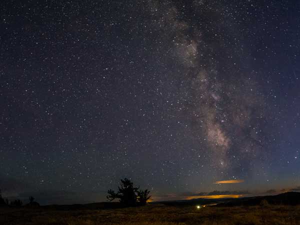The night sky, bright with stars and the Milky Way, in Wind River Country, Wyoming