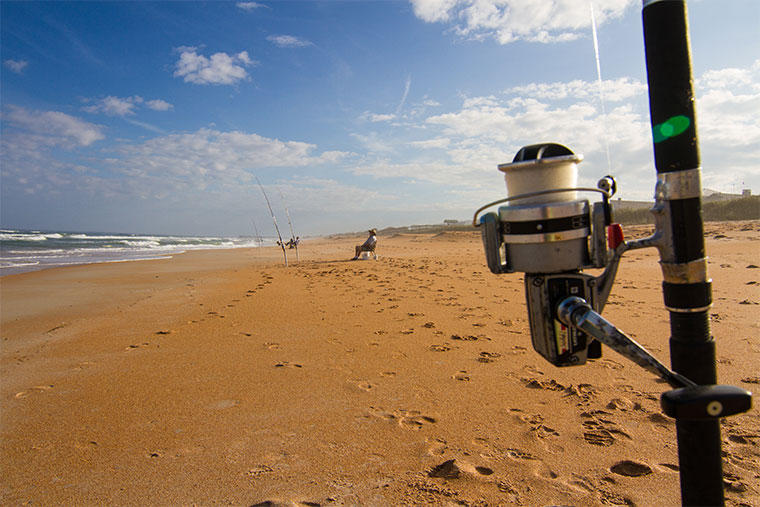 Fishermen fish from Palm Coast Florida Flagler Beach