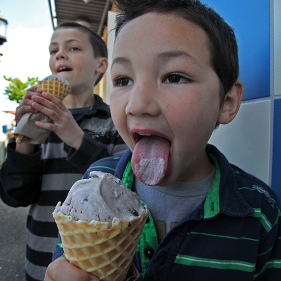 Kids eating ice cream cones in Seaside, OR