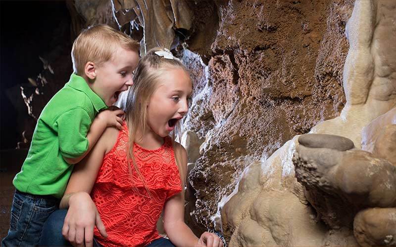 Children amazed at Talking Rocks Cavern in Table Rock Lake, MO
