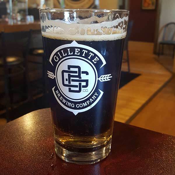 A pint glass filled with beer from the Gillette Brewing Company in Gillette, Wyoming