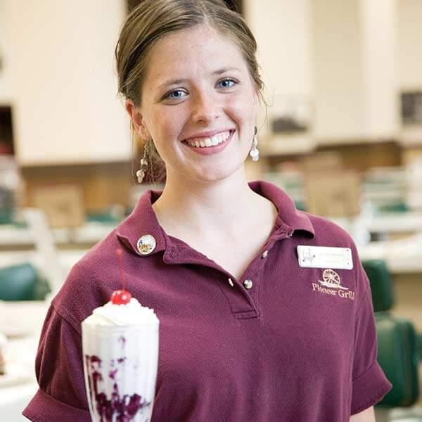 A server holds a huckleberry sundae at the Pioneer Grill at Jackson Lake Lodge in Grand Teton National Park in Moran, Wyoming