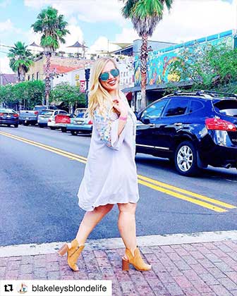 A girl crosses the street in the five points neighborhood in Jacksonville, FL