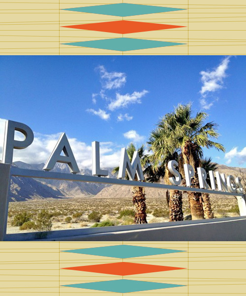 Palm Springs, California, welcome sign with mountains and palm trees in the background