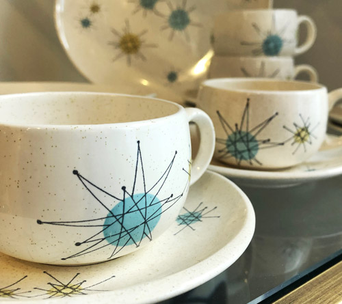 Teal, green, and white Franciscan Starburst cups and plates at Bon Vivant in Palm Springs, California’s Uptown Design District