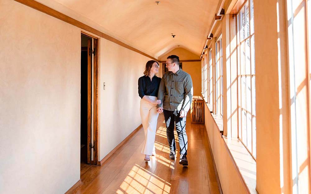 A couple walks through the Frank Lloyd Wright’s Graycliff Estate in Derby.