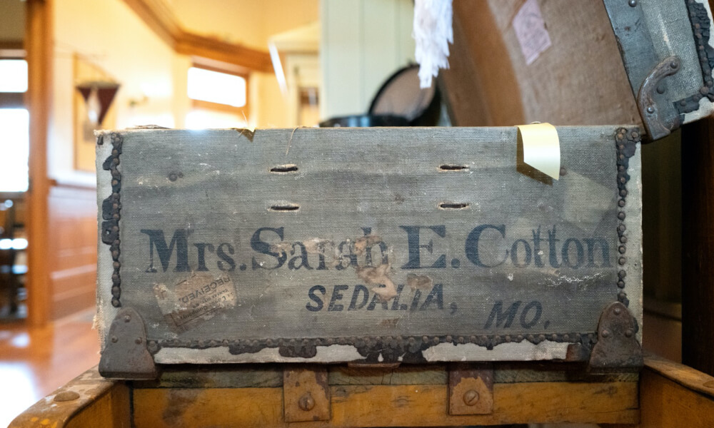 A historic wooden trunk labeled rs. Sarah E. Cotton