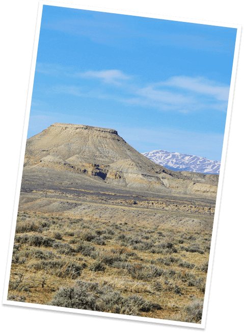 A peak plateaus into a tabletop mesa called Crowheart Butte in rural Fremont County, Wyoming.