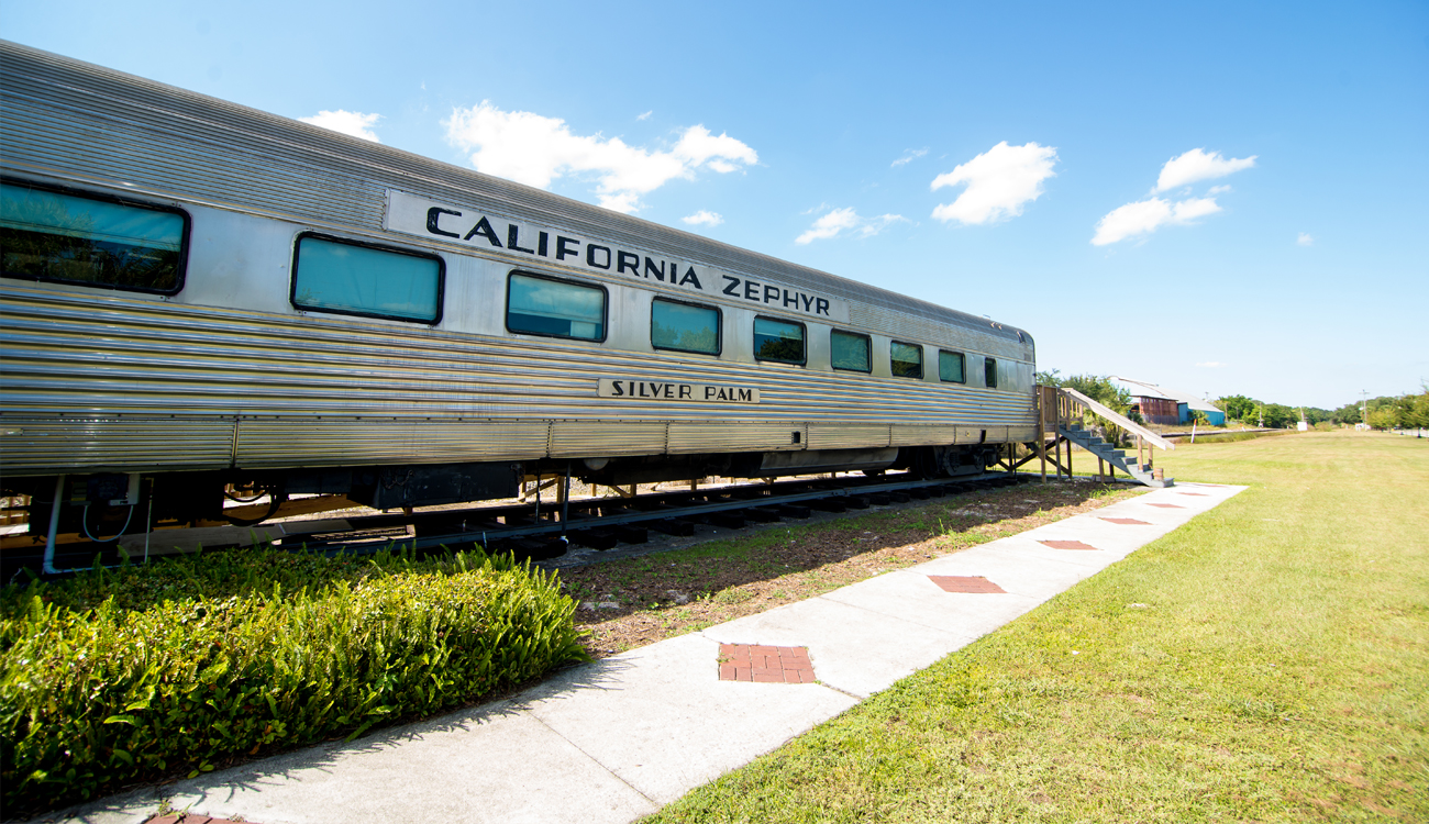 A silver train car labeled California Zephyr is open for visitors to tour at The Avon Park Depot Mueum in Avon Park, Florida.
